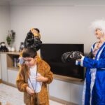 Family trying on carnival costumes for celebration
