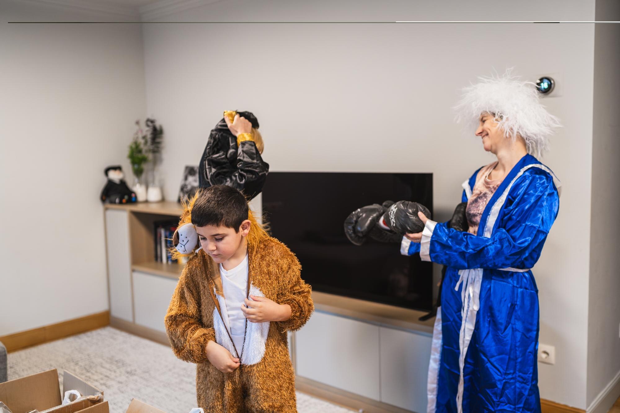 Family trying on carnival costumes for celebration