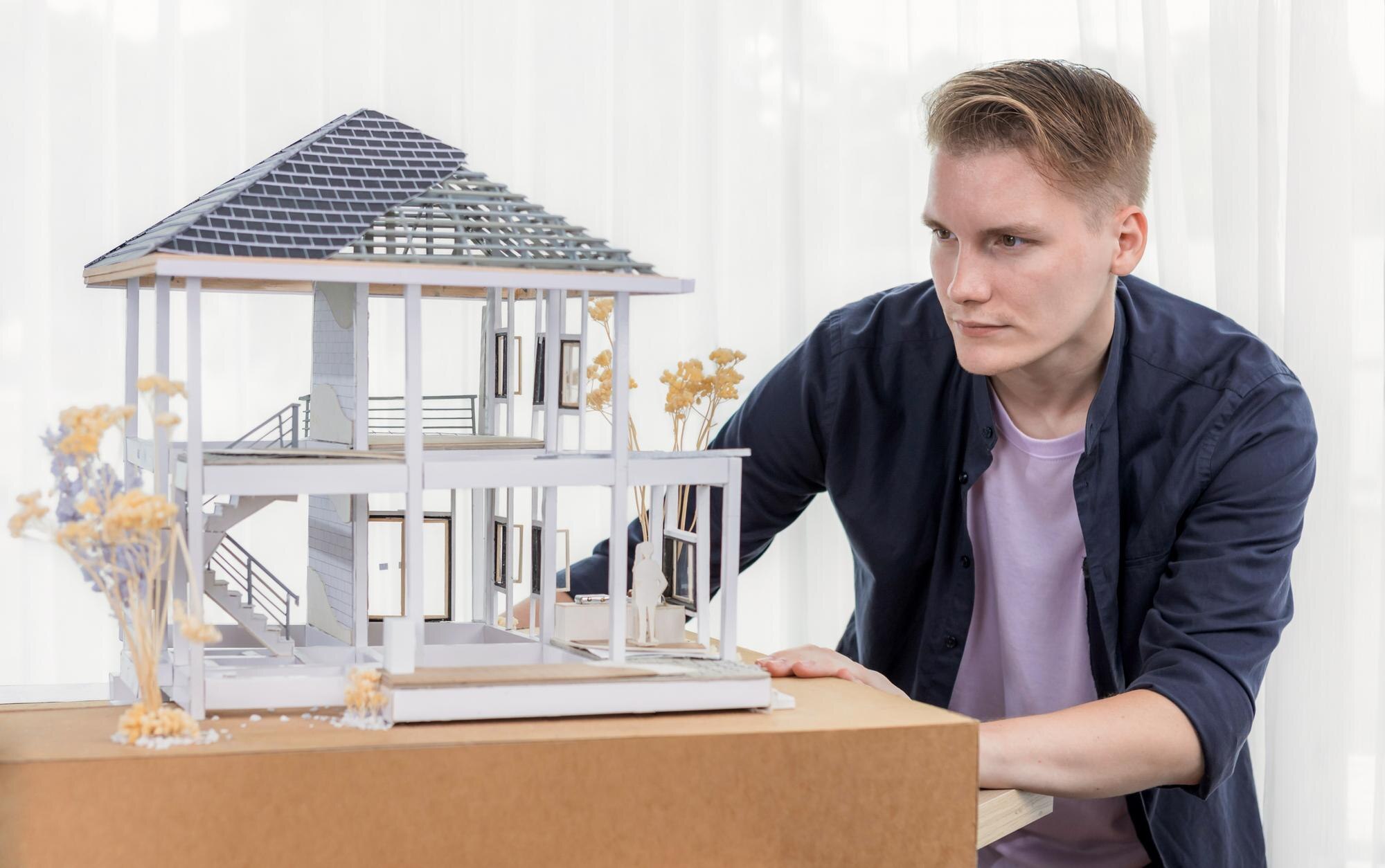 Projektant architektoniczny przeglądający model ramy domu bez ściany brainstorming projekt wnętrz i pomysł ulepszeń w rzeczywistej skali domu Profesjonalny i kreatywny w projektowaniu architektonicznym Iteracja